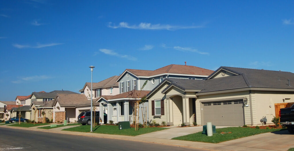 Homes on Street on Sunny Day