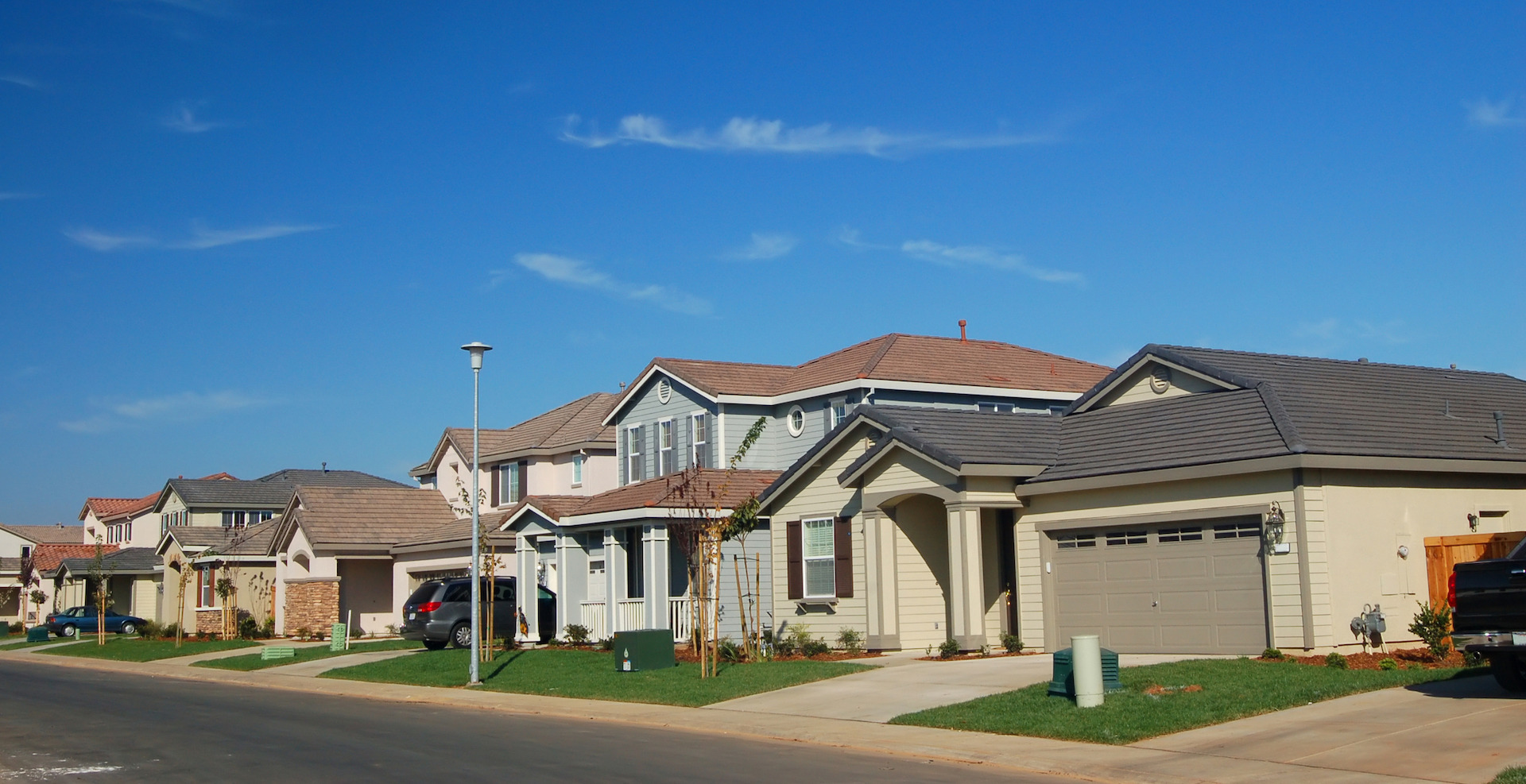 Homes on Street on Sunny Day
